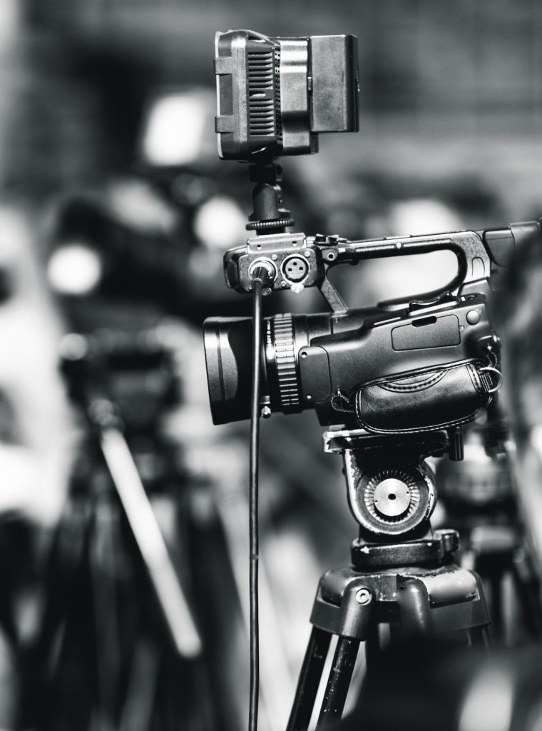 Camera at a media conference