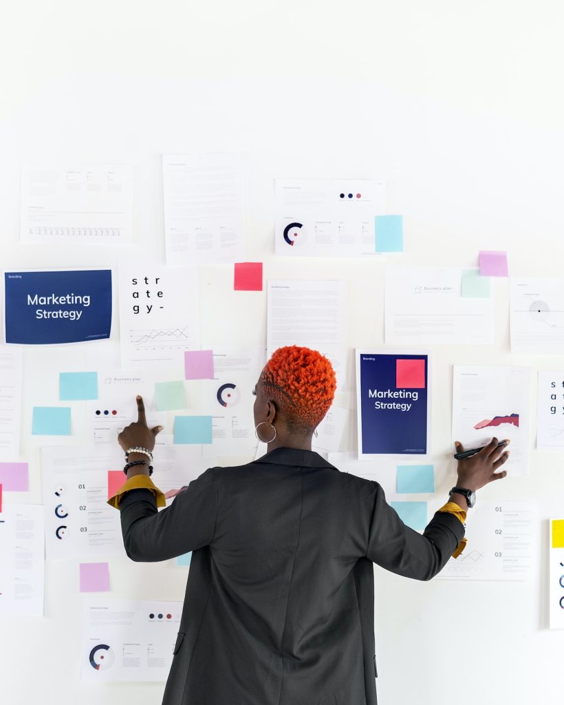 Cool black businesswoman planning a marketing strategy