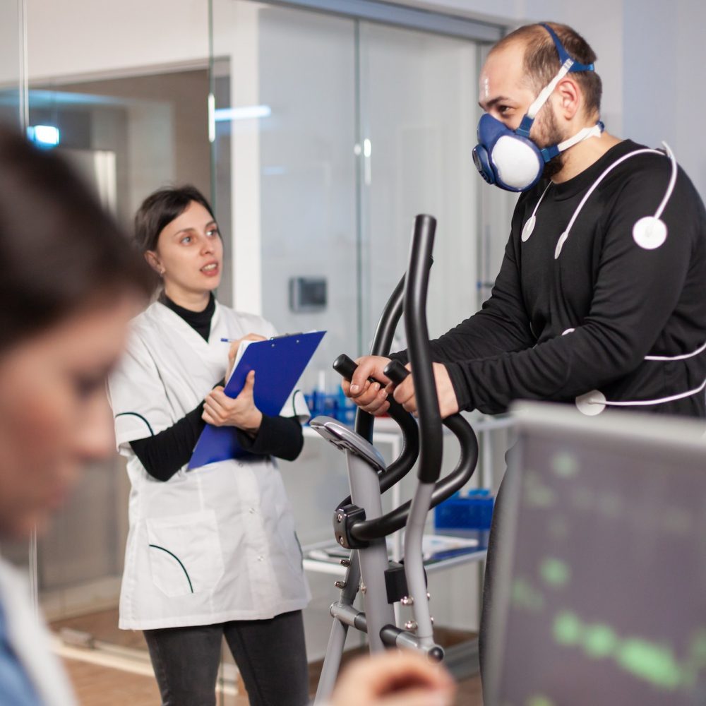 Performance athlete running in lab science testing endurance
